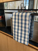 Torchon bleu à carreaux